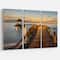 Designart - Brown Wooden Pier in Evening - Seashore Photo Canvas Print